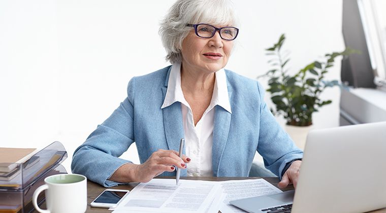 A healthy remote employee works from her home office. 