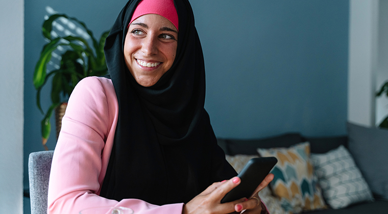 A job candidate smiles after a great job interview experience. 